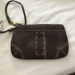 Dark brown coach wristlet